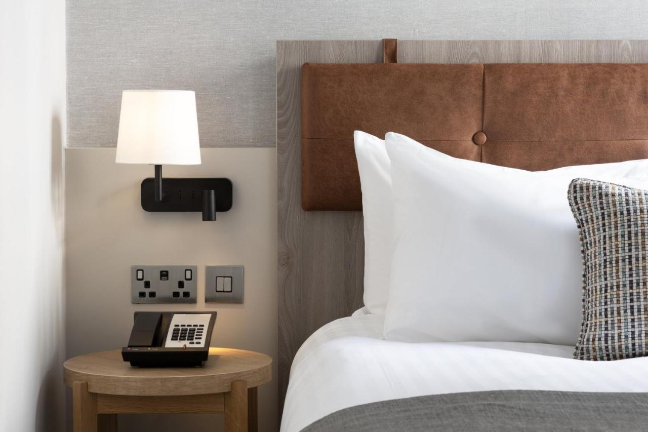 Studio Lit King-Size avec Kitchenette et Espace Ergonomique Flex