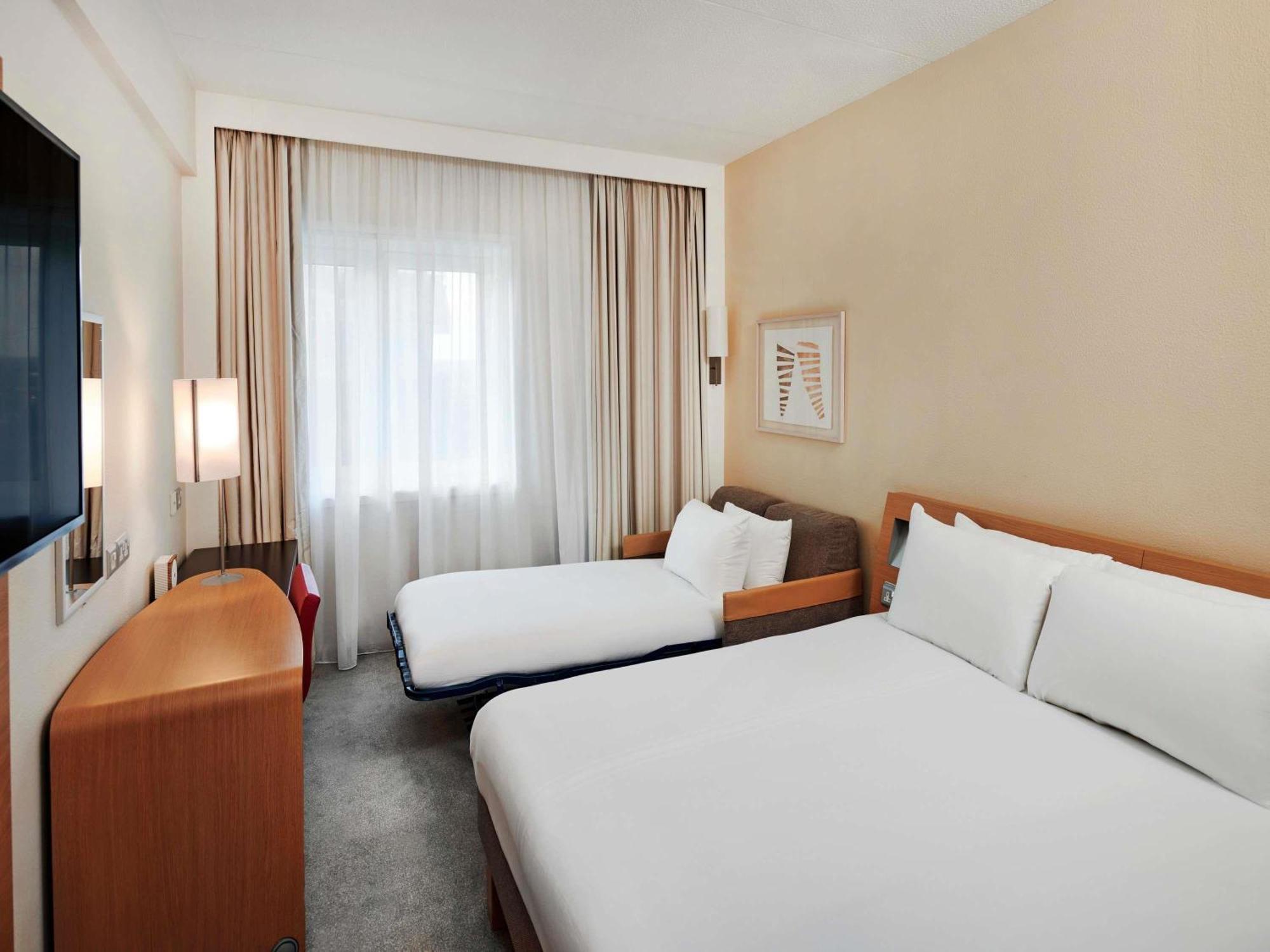 Chambre Exécutive avec Lit Queen-Size et Canapé